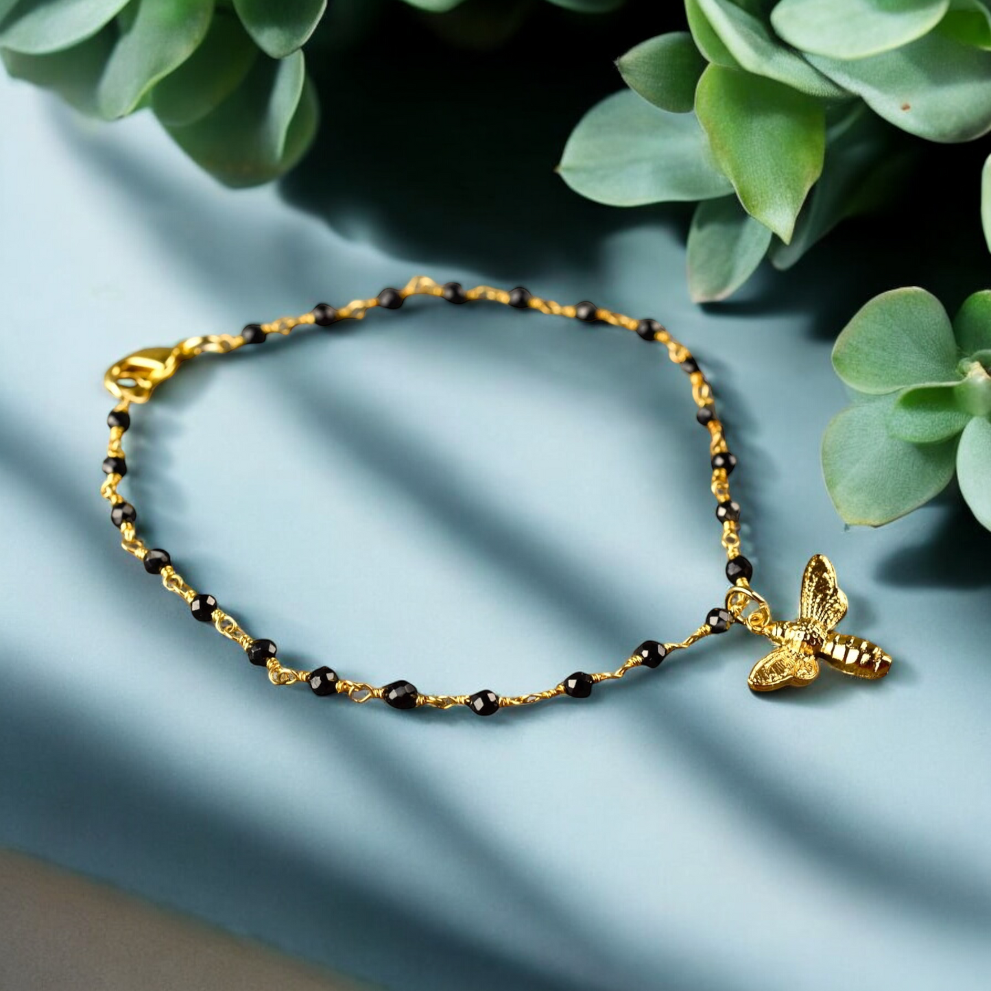 Gold bumblebee bracelet with onyx - gemstone bracelet with petite…