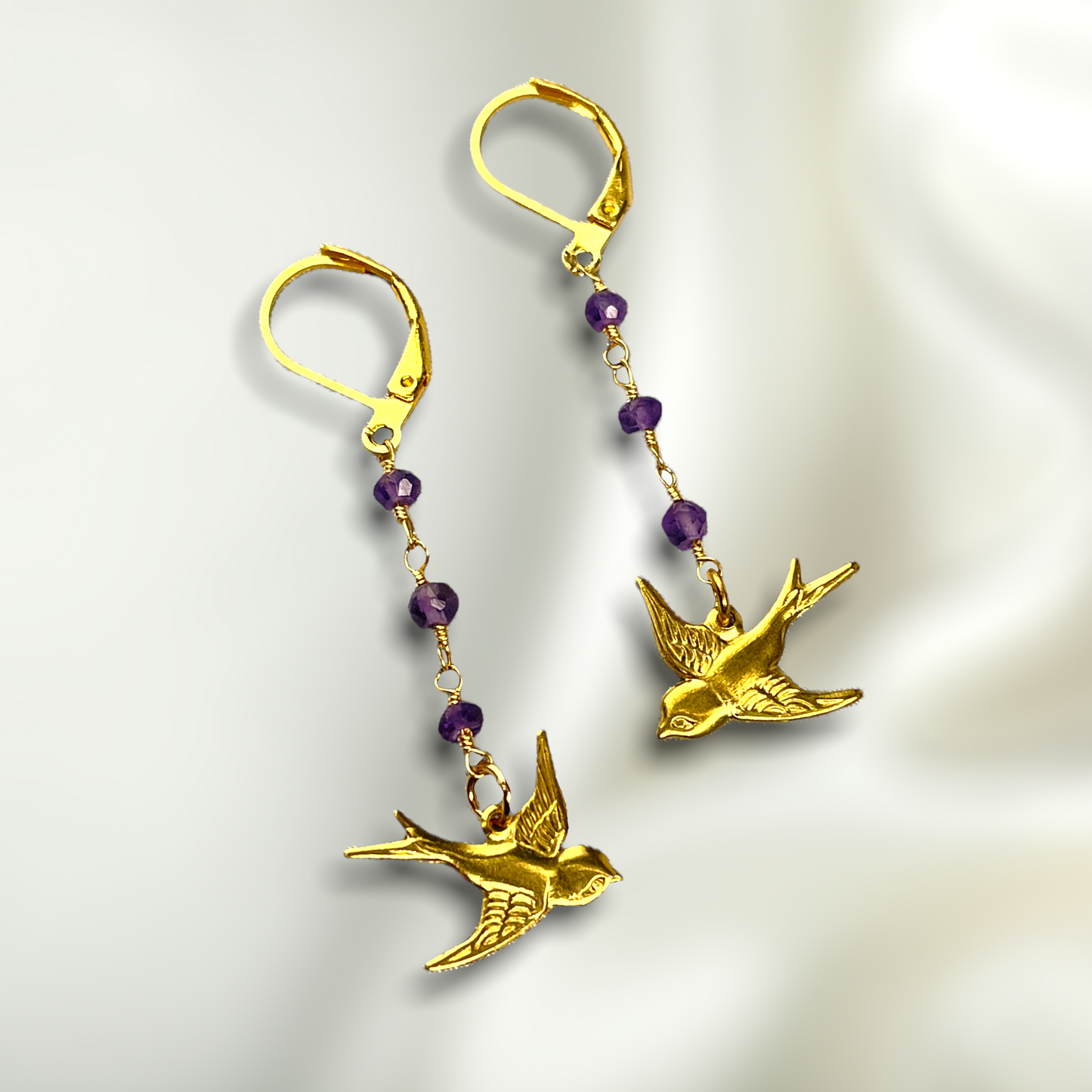 Amethyst swallows gold earrings