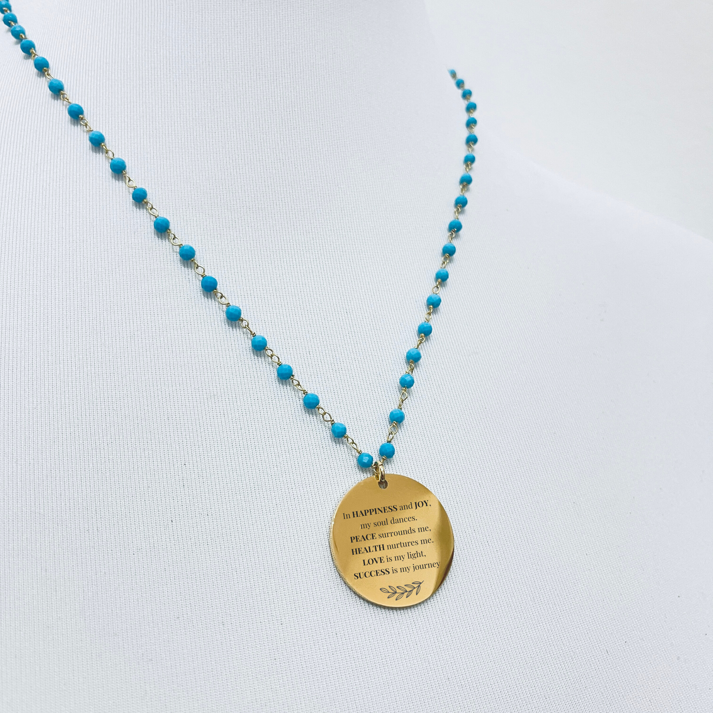Gold-plated gemstone necklace with turquoise pendant: Your lucky…