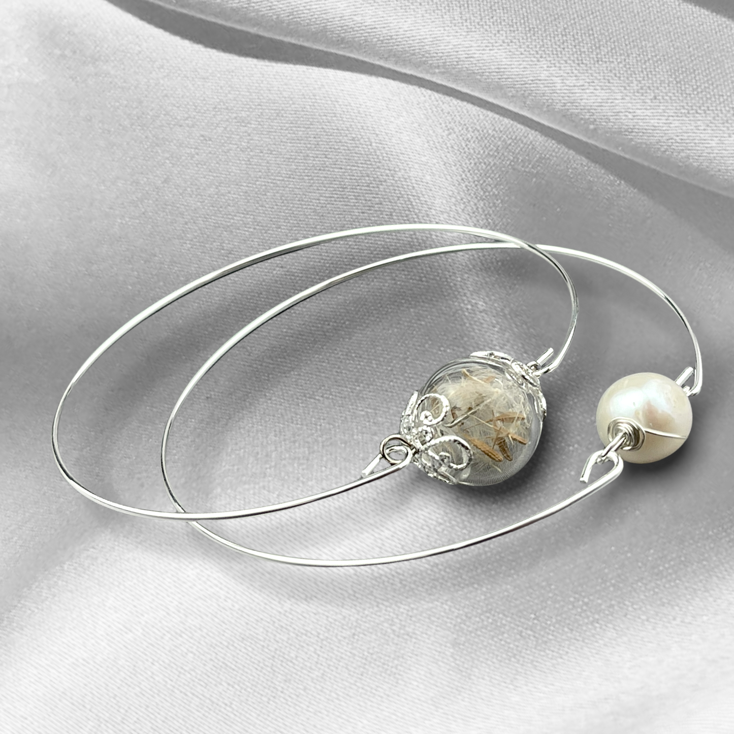 Bangles in the double pack real pulse flowers and freshwater pearl…